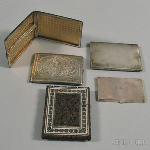 Four Sterling Silver Cases and One Carved and Inlaid Sandalwood Case