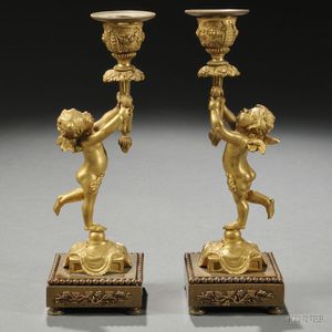 Pair of Figural Gilt-bronze Candlesticks