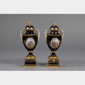 Two Similar Dresden Porcelain Mantel Urns and Covers