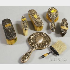 Six Sterling Silver-mounted Brushes and a Hand Mirror