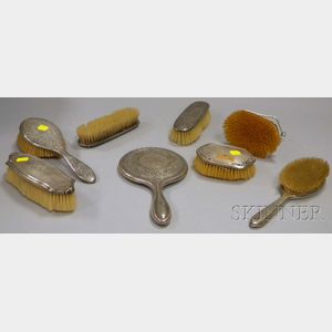 Seven Sterling Silver-mounted Brushes and a Hand Mirror
