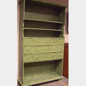 Green Painted Open Cupboard with Fifteen Drawers.