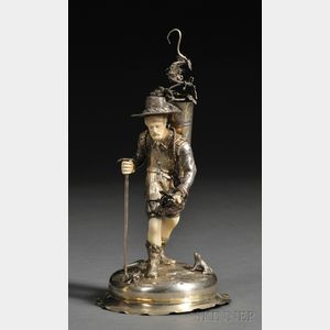 German Goldwashed Silver and Ivory-mounted Figure of a Man Harvesting Grapes