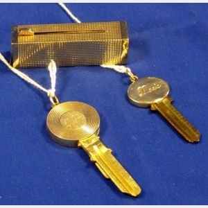 14kt Yellow Gold Lipstick Case with Two 14kt Mounted House Keys.