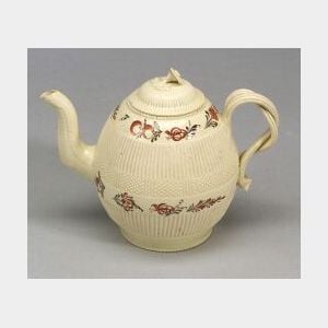 Two Staffordshire Creamware Teapots and Covers
