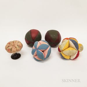 Four Toy Balls and a Pincushion
