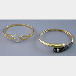 14kt Gold, Onyx, and Diamond and 18kt Gold and Diamond Bangles.