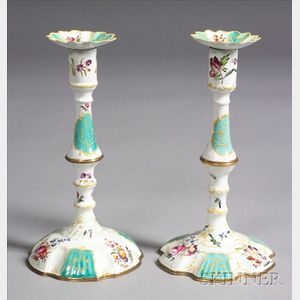 Two Painted Battersea Enameled Brass Candlesticks