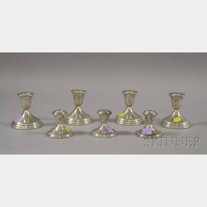 Seven Silver Weighted Low Candlesticks