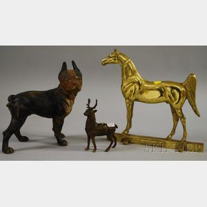 Two Figural Doorstops and a Cast Iron Stag Still Bank