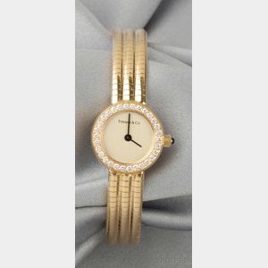 Lady's 18kt Gold and Diamond Wristwatch, Tiffany & Co.