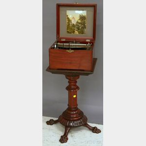 Swiss Mahogany Cased Mechanical 9 1/4-in. Disc Music Player with a Carved Mahogany Stand