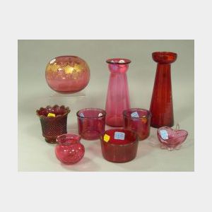 Nine Cranberry Art Glass Table Items.