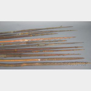 Eleven New Guinea Carved Wood and Cane Spears