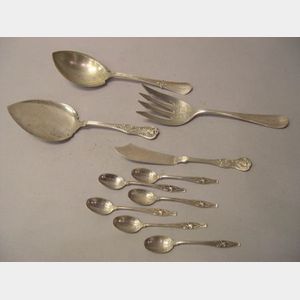 Five Sterling Silver Demitasse Spoons and Four Sterling Silver Serving Pieces.
