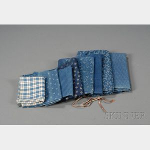 Eight Small Lengths of Blue and White Fabric