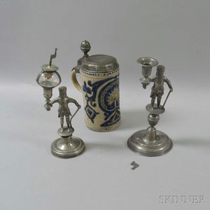Two Pewter Figural Candlesticks and a Cobalt-decorated Salt-glazed Stein. 