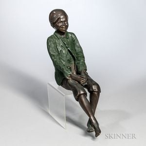 Painted Bronze Figure of a Seated African American Man. 