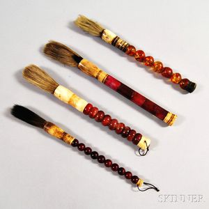 Four Red Hardstone Calligraphy Brushes