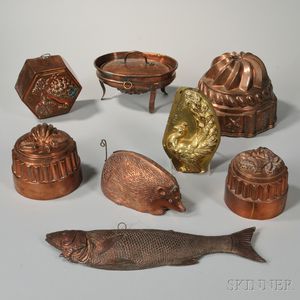 Eight Copper and Brass Food Molds