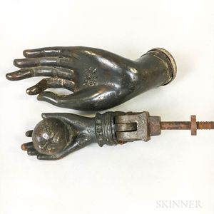 Cast Iron Door Knocker of a Hand and Apple and a Bronze Buddha Hand