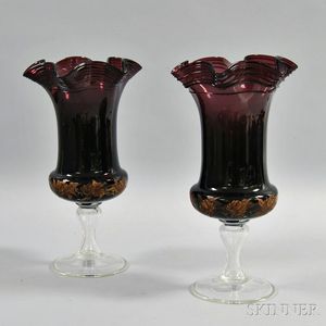 Pair of Amethyst Glass Footed Urns
