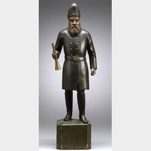 Painted Carved Wood Figure of a Fireman.