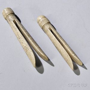 Two Carved and Incised Whalebone Clothespins