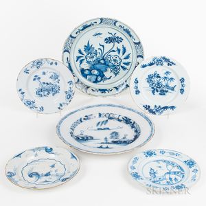 Two Tin-glazed Blue and White Delftware Chargers and Four Plates