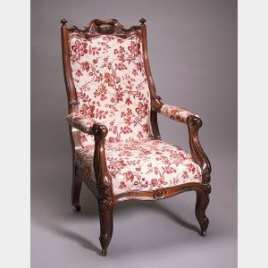 Victorian Renaissance Revival Upholstered Carved Rosewood Armchair.