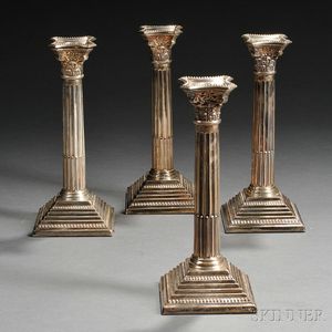Four Elizabeth II Sterling Silver Candlesticks