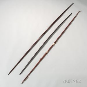 Three Amazon Carved Wood Bows