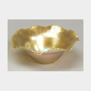 Quezal Gold Iridescent Art Glass Bowl, New York, early 20th century, flared, ruffled, and stretched rim, polished pontil, signed Quezal