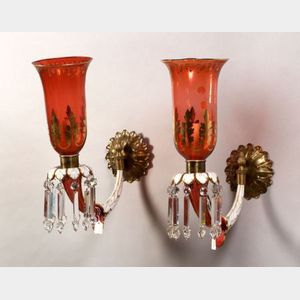 Pair of Bohemian Cranberry Flashed and White Cased Cut Glass and Brass Wall Sconces