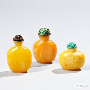 Three Reconstituted Amber Snuff Bottles
