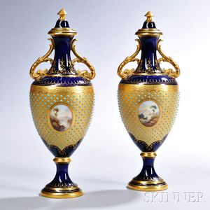 Two Similar Jeweled Coalport Porcelain Vases and Covers