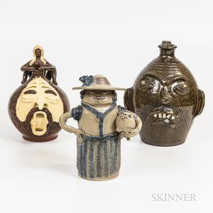 Two Southern Folk Pottery Face Jugs and a Stoneware Bank