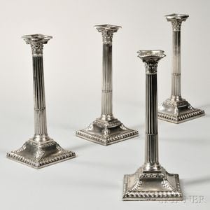 Four Assembled George III Sterling Silver Candlesticks