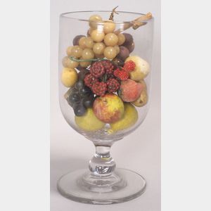 Large Colorless Blown Glass Goblet Containing Stone Fruit