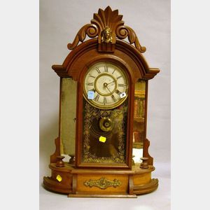 New Haven Clock Co. Victorian Walnut Mirror-side Shelf Clock.