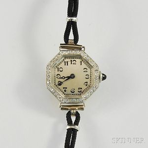 Lady's 18kt Gold and Diamond Wristwatch