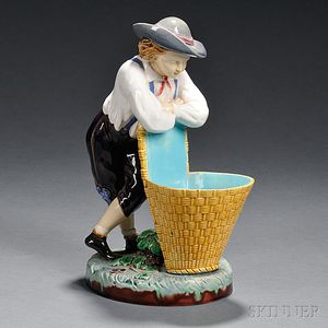 Minton Majolica Model of a Boy Resting on a Tall Basket