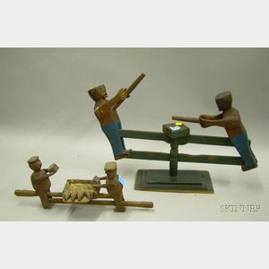 Folk Carved Wooden Articulated Push-Pull Figural Bakers Making Bread Toy and a Figures Hammering Toy.