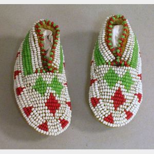 Pair of Miniature Plains-style Beaded Hide Moccasins.