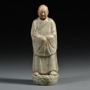 Celadon Glazed Stoneware Figure of a Monk