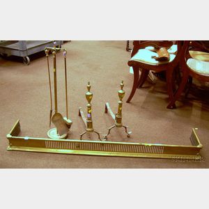 Pair of Urn Finial Andirons, a Reticulated Brass Fenders, and a Tool Stand with a Set of Three Tools.