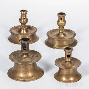 Four Early Brass Candlesticks