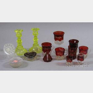 Ten Pieces of Ruby Flash Glass, Six Sandwich Glass Colorless Pressed Lacy Cup Plates, and a Pair of Canary Glass Candlesticks