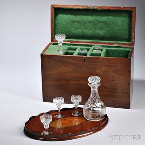 Mahogany Liquor Box, England, 19th century, the dovetailed case with felt-lined compartments for an etched glass decanter and six match