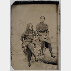 Tintype Depicting Two Black Women Seated on Logs